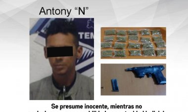 Par de presuntos hampones, aprehendido con droga y arma