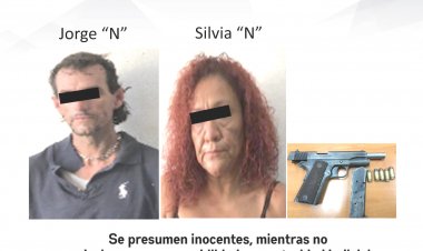 Esta pareja está acusada de traer arma prohibida cargada